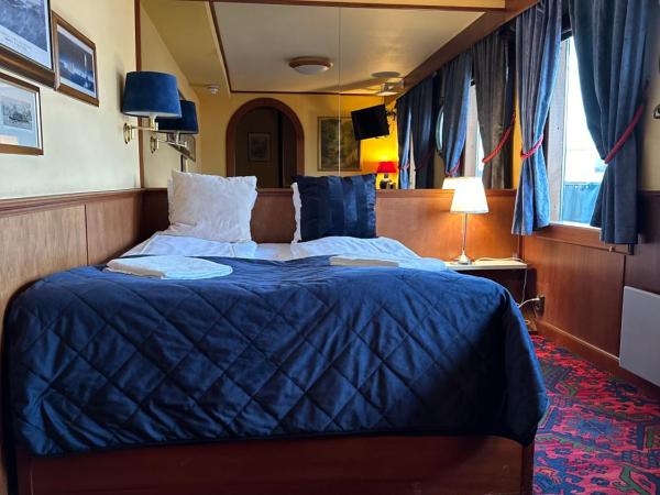 Den Röda Båten : photo 2 de la chambre cabine de bateau avec salle de bains privative - vue sur la mer