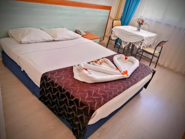 Uyum Hotel : photo 3 de la chambre chambre double ou lits jumeaux