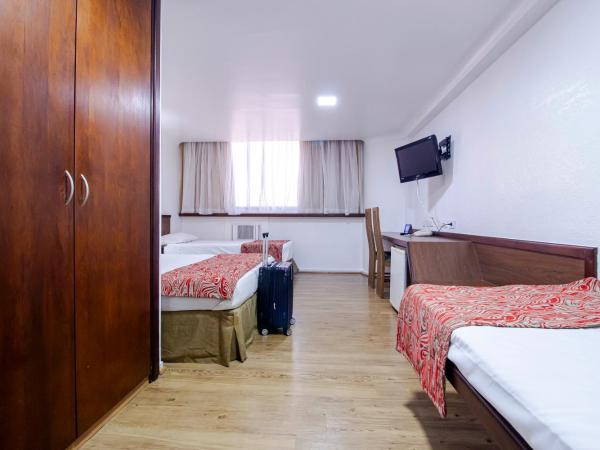 Hotel Dan Inn Curitiba Centro- 1,5Km do Estádio Couto Pereira -Show : photo 7 de la chambre chambre quadruple