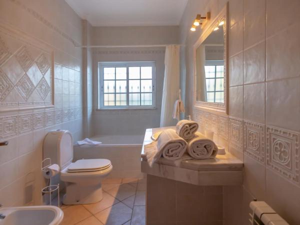 Al Meida Guesthouse : photo 4 de la chambre chambre deluxe double ou lits jumeaux