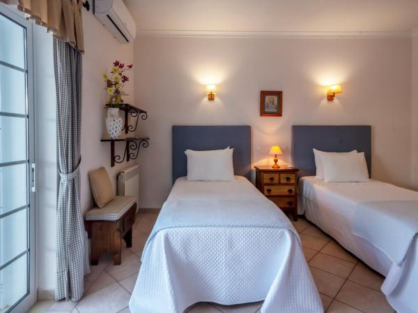 Al Meida Guesthouse : photo 2 de la chambre chambre deluxe double ou lits jumeaux