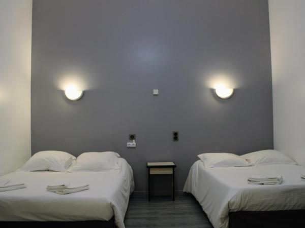 Hôtel Le Milan : photo 2 de la chambre chambre quadruple