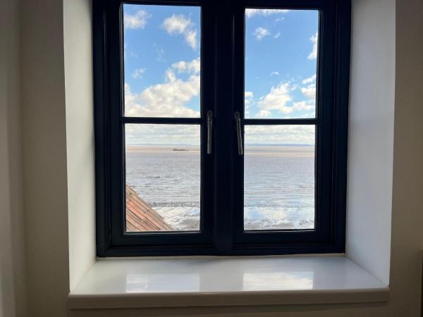 Beachcliff Rooms & Apartments : photo 6 de la chambre suite deluxe avec lit king-size