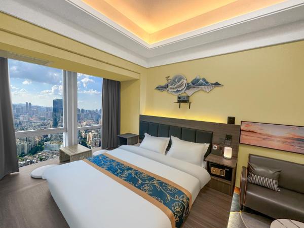 Xingyin Cloudy Hotel Guangzhou Changgang Subway Station - Free Shuttle Bus to Canton Fair Complex During Canton Fair Period : photo 5 de la chambre chambre lit king-size - vue sur ville