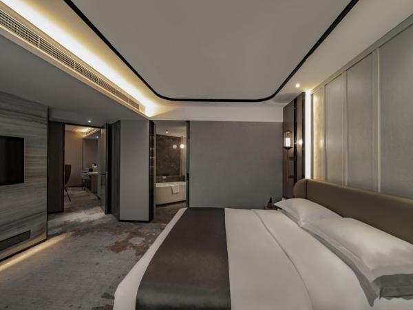 Howard Johnson Paragon Hotel Beijing Central : photo 2 de la chambre suite exécutive