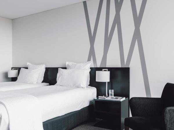 Quay West Suites Melbourne : photo 1 de la chambre chambre studio lits jumeaux