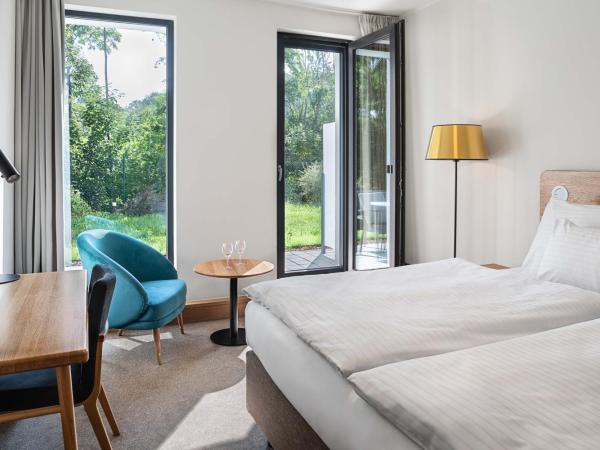 Hotel Golf Prague : photo 1 de la chambre chambre double ou lits jumeaux dépendance avec jardin - bâtiment annexe