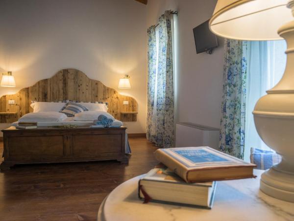 La Vineria di San Mattia : photo 1 de la chambre grande chambre double ou lits jumeaux