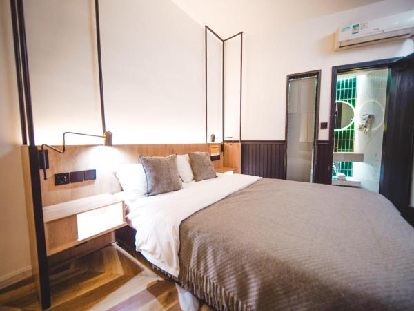 POSHPACKER·Chengdu Local Tea Hostel : photo 4 de la chambre chambre double Économique avec salle de bains privative