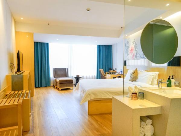 Paco Hotel Tuanyida Metro Guangzhou-Canton Fair free shuttle bus : photo 3 de la chambre chambre lit queen-size boutique