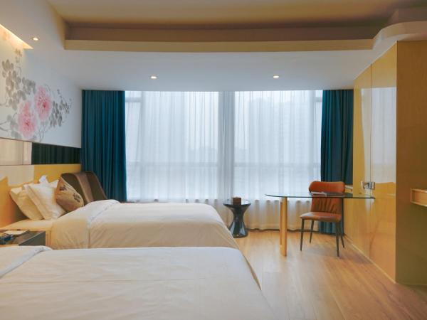 Paco Hotel Tuanyida Metro Guangzhou-Canton Fair free shuttle bus : photo 3 de la chambre chambre lits jumeaux de caractère