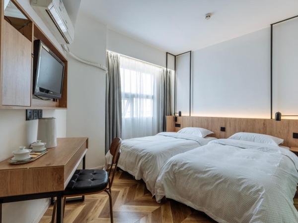 POSHPACKER·Chengdu Local Tea Hostel : photo 5 de la chambre chambre lits jumeaux confort avec salle de bains privative