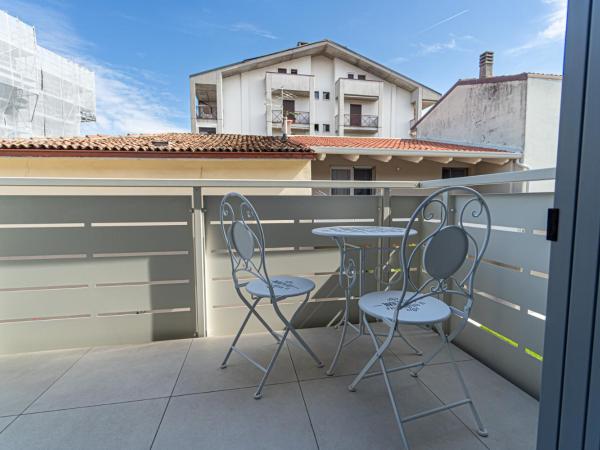 CASA LORENZO : photo 1 de la chambre chambre triple avec balcon