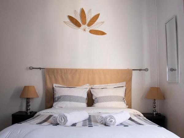 Hôtel Le Tivoli : photo 5 de la chambre chambre double confort