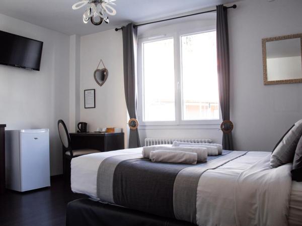 Hôtel Le Tivoli : photo 6 de la chambre chambre double confort