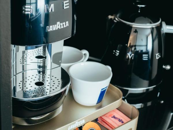 Ramada Diplomat Canberra : photo 2 de la chambre chambre lit queen-size