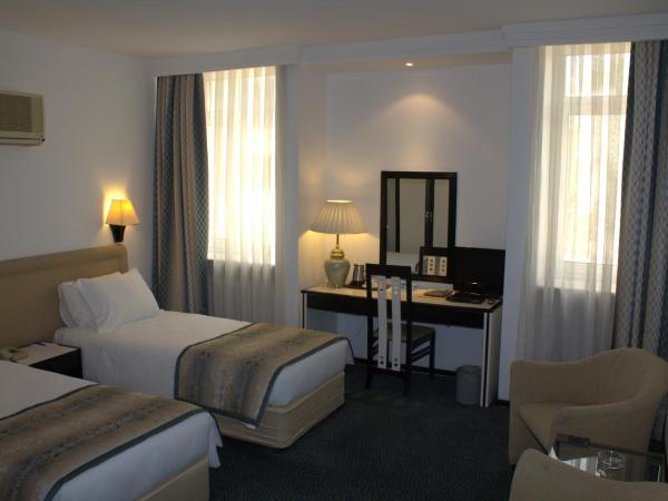 King Hotel Guvenlik : photo 1 de la chambre chambre double ou lits jumeaux