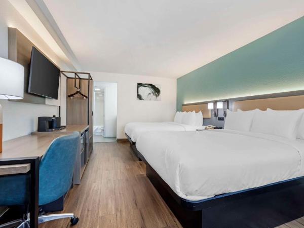 Comfort Inn Sea World Area : photo 1 de la chambre chambre quadruple avec 2 lits queen-size - non-fumeurs