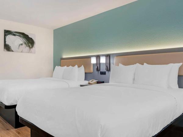 Comfort Inn Sea World Area : photo 2 de la chambre chambre quadruple avec 2 lits queen-size - non-fumeurs