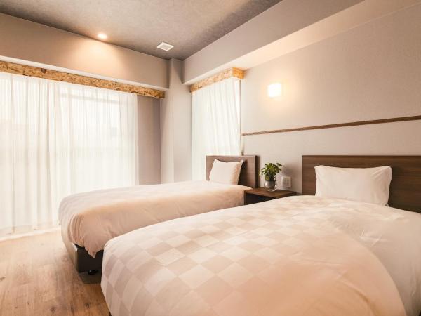 WAYFARER Kyoto Shijo : photo 3 de la chambre hébergement lits jumeaux essentiel - non-fumeurs