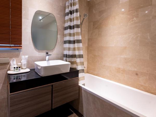 Sukhothai Residence Ruam Ruedi : photo 1 de la chambre family one bedroom suite - non-smoking