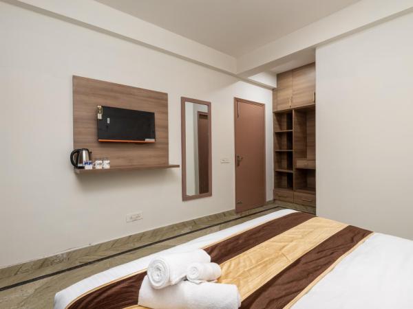 Saavi Hotel Medicity : photo 1 de la chambre chambre double deluxe