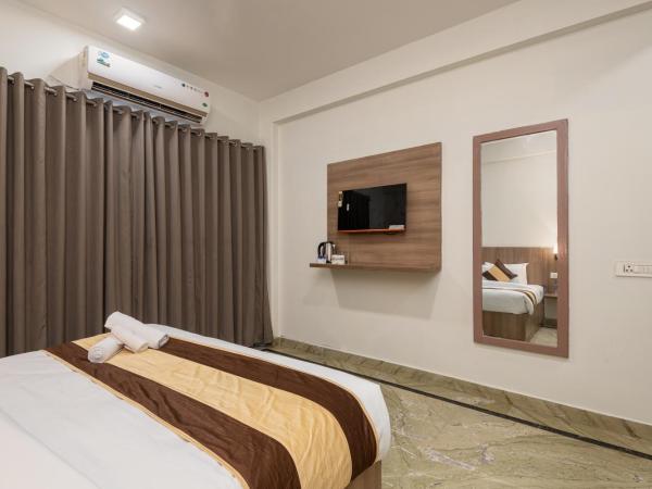 Saavi Hotel Medicity : photo 4 de la chambre chambre double deluxe