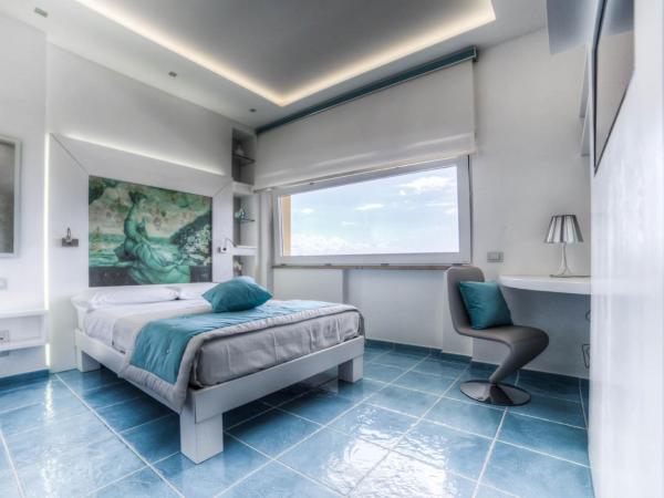 La Madegra Seasuite : photo 2 de la chambre chambre double deluxe - vue sur mer