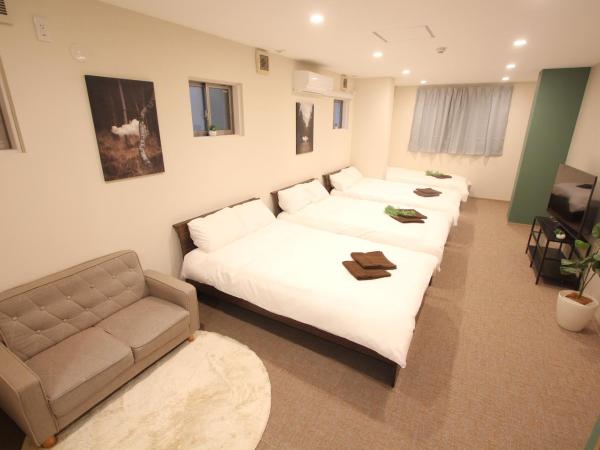 LUANAHOTEL IN KOUENJI : photo 1 de la chambre suite familiale