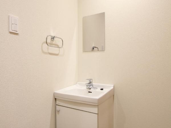 LUANAHOTEL IN KOUENJI : photo 9 de la chambre suite familiale