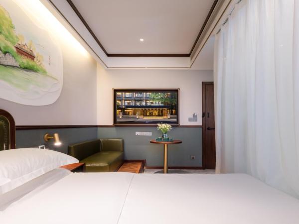 Time Traveller Boutique Hotel -Near Chengdu Wide narrow lane, People's Park, Chengdu Panda Base, 10 minutes walk to subway , Eat chaffy dish, Free night snack, Free laundry, English communication well, Free travel advice : photo 2 de la chambre chambre tatami