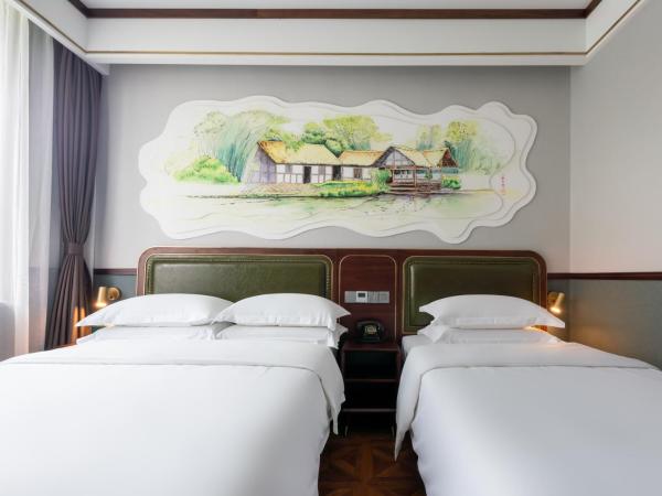 Time Traveller Boutique Hotel -Near Chengdu Wide narrow lane, People's Park, Chengdu Panda Base, 10 minutes walk to subway , Eat chaffy dish, Free night snack, Free laundry, English communication well, Free travel advice : photo 3 de la chambre chambre familiale standard