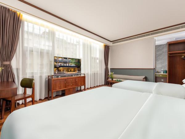 Time Traveller Boutique Hotel -Near Chengdu Wide narrow lane, People's Park, Chengdu Panda Base, 10 minutes walk to subway , Eat chaffy dish, Free night snack, Free laundry, English communication well, Free travel advice : photo 2 de la chambre chambre familiale supérieure