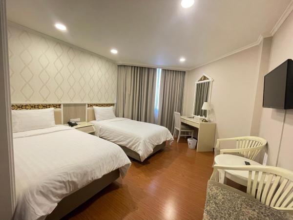 Wangcome Hotel : photo 1 de la chambre chambre familiale