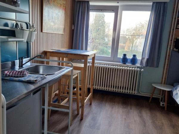 Adagio Brugge : photo 10 de la chambre chambre lit king-size - vue sur jardin