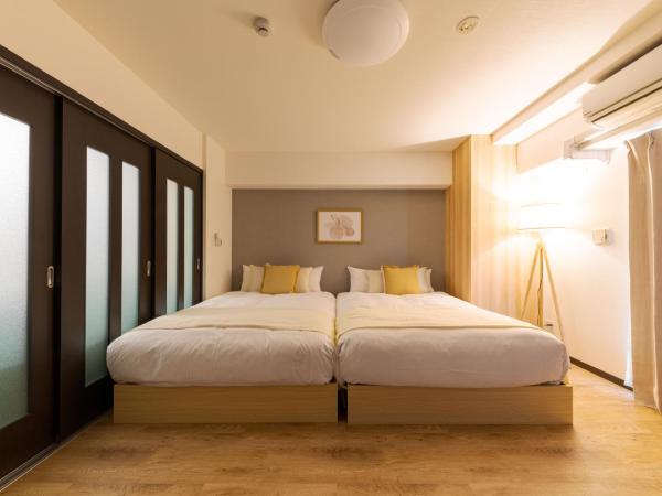 TAKUTO STAY SAKAISUJI-HOMMACHI : photo 4 de la chambre chambre lits jumeaux deluxe