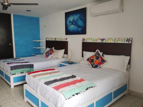 T´úubul K´iin Bed & Breakfast : photo 6 de la chambre chambre lits jumeaux