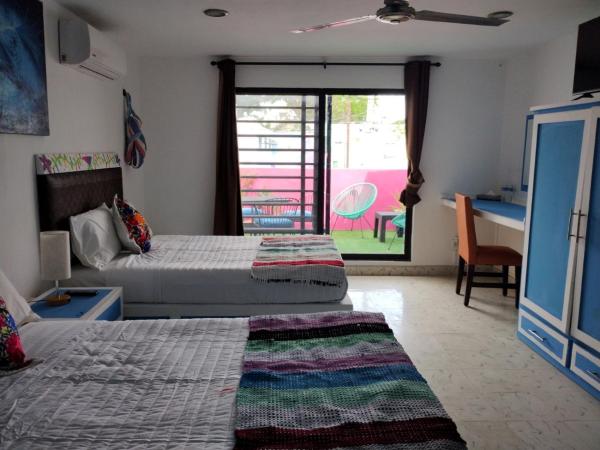 T´úubul K´iin Bed & Breakfast : photo 3 de la chambre chambre lits jumeaux