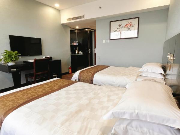 Skyline Plaza Hotel Guangzhou : photo 4 de la chambre chambre lits jumeaux deluxe
