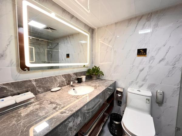 Skyline Plaza Hotel Guangzhou : photo 7 de la chambre chambre lit queen-size premium