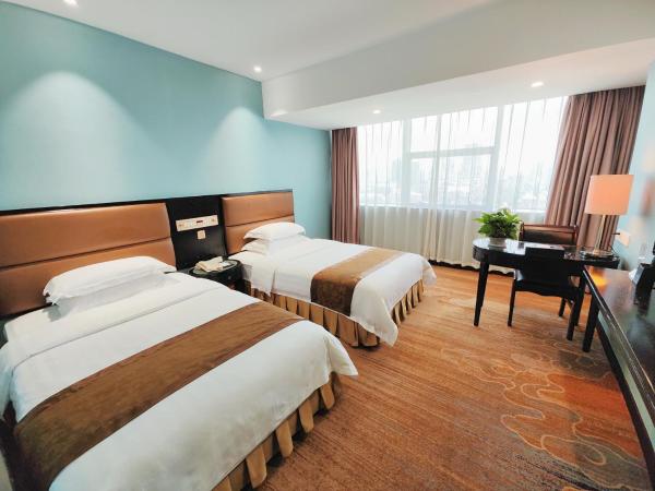 Skyline Plaza Hotel Guangzhou : photo 2 de la chambre chambre lits jumeaux exécutive