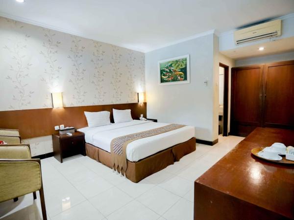 Cakra Kembang Hotel : photo 2 de la chambre chambre deluxe double ou lits jumeaux