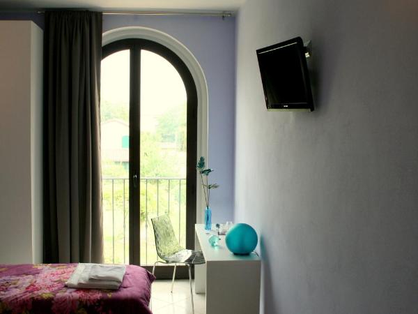 Agriturismo Argaland : photo 9 de la chambre chambre double ou lits jumeaux - vue sur jardin