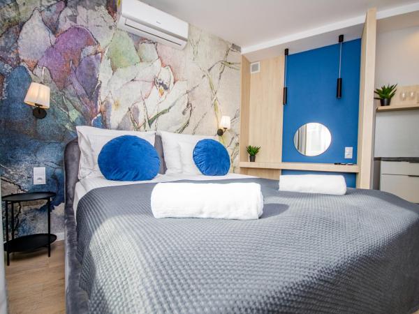 InPoint Aparthotel Grzegórzecka 11 : photo 1 de la chambre appartement avec terrasse