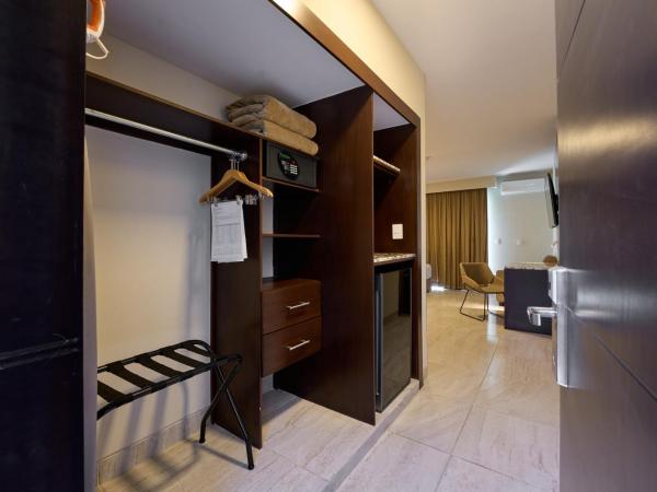 Hotel Estancia Business Class : photo 6 de la chambre suite exécutive