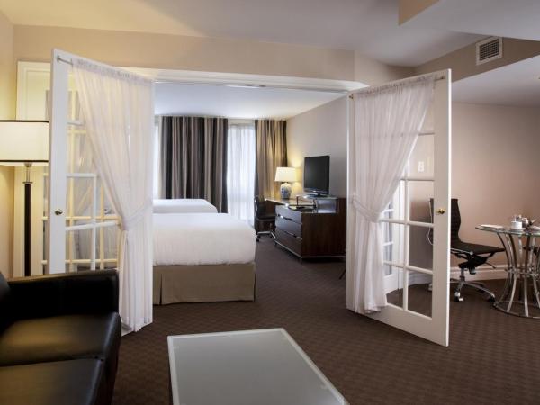 Hôtel Le Cantlie Suites : photo 2 de la chambre suite exécutive avec 2 lits doubles