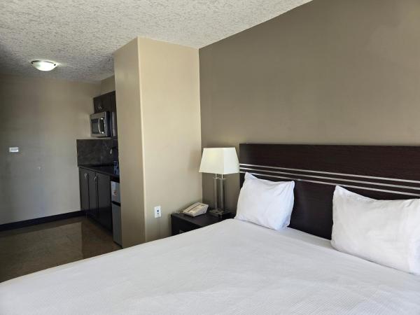 Royal Lodge : photo 5 de la chambre chambre lit queen-size