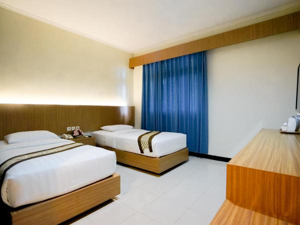 Cakra Kusuma Hotel : photo 1 de la chambre chambre lits jumeaux supérieure