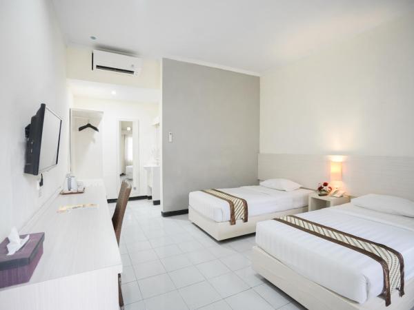Cakra Kusuma Hotel : photo 4 de la chambre chambre lits jumeaux deluxe