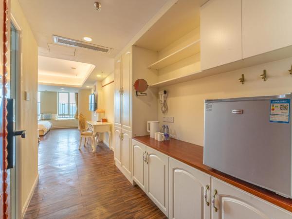 The Legend Hotel- Free Deliver Service to Canton Fair Complex During Canton Fair Period : photo 7 de la chambre chambre lit queen-size deluxe